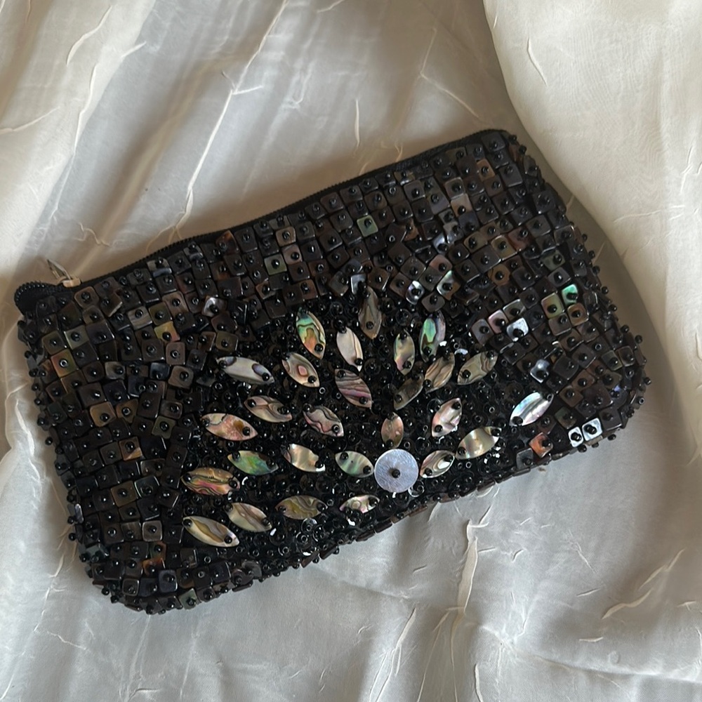 Black Pearl Paia shell clutch bag peacock design